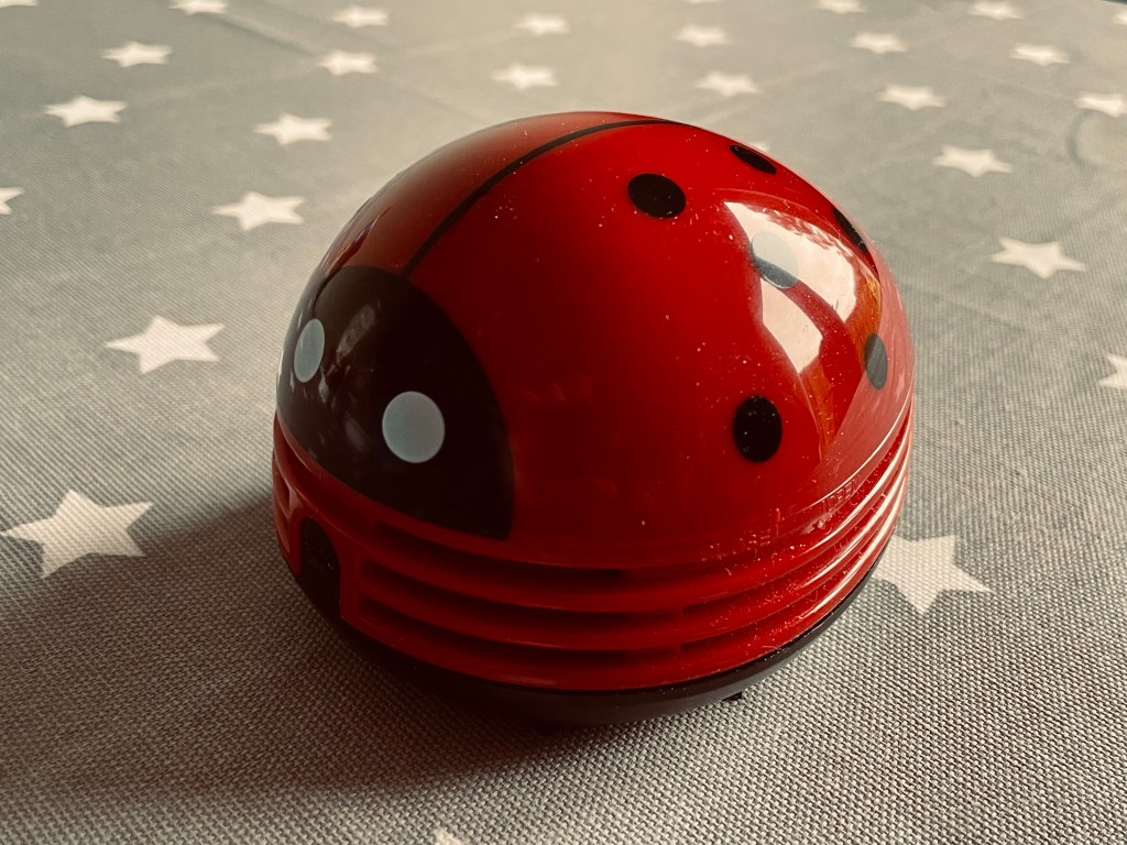 Gaston the tabletop vacuum cleaner designed to look like a ladybird